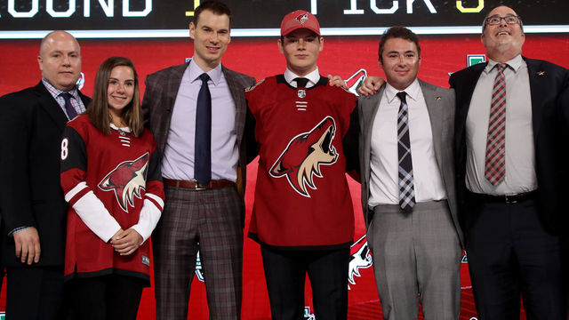 DALLAS, TX - JUNE 22: Barrett Hayton poses after being selected fifth overall by the Arizona Coyotes during the first round of the 2018 NHL Draft at American Airlines Center on June 22, 2018 in Dallas, Texas.