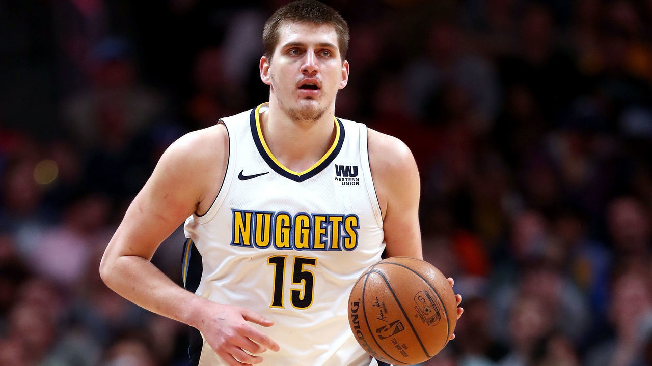DENVER, CO - APRIL 03: Nikola Jokic #15 of the Denver Nuggets brings the ball down the court against the Indiana Pacers at the Pepsi Center on April 3, 2018 in Denver, Colorado.