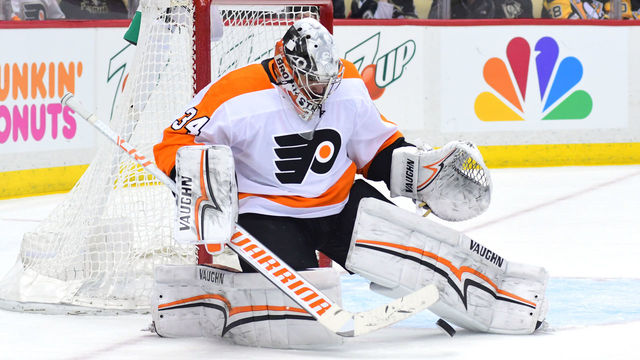 PITTSBURGH, PA - MARCH 25: Petr Mrazek #34 of the Philadelphia Flyers makes a save against the Pittsburgh Penguins at PPG PAINTS Arena on March 25, 2018 in Pittsburgh, Pennsylvania.