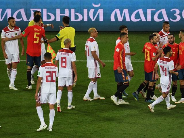 Morocco's and Spain's players argue during the Russia 2018 World Cup Group B football match between Spain and Morocco at the Kaliningrad Stadium in Kaliningrad on June 25, 2018.