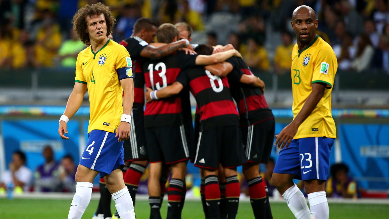BELO HORIZONTE, BRAZIL - JULY 08: David Luiz and Maicon of Brazil look dejected after allowing Germany's fifth goal during the 2014 FIFA World Cup Brazil Semi Final match between Brazil and Germany at Estadio Mineirao on July 8, 2014 in Belo Horizonte, Brazil.
