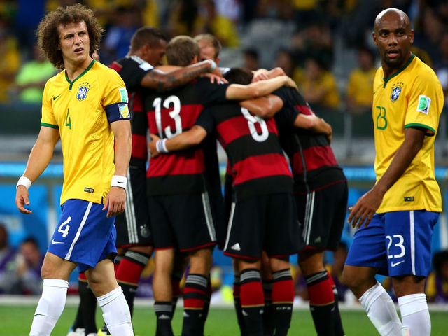 BELO HORIZONTE, BRAZIL - JULY 08: David Luiz and Maicon of Brazil look dejected after allowing Germany's fifth goal during the 2014 FIFA World Cup Brazil Semi Final match between Brazil and Germany at Estadio Mineirao on July 8, 2014 in Belo Horizonte, Brazil.
