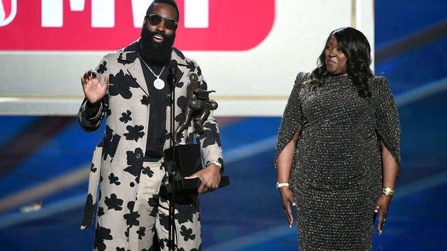 SANTA MONICA, CA - JUNE 25: MVP winner James Harden and Monja Willis speak onstage at the 2018 NBA Awards at Barkar Hangar on June 25, 2018 in Santa Monica, California.