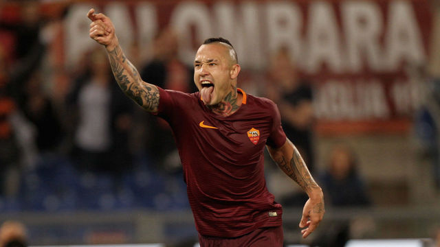 ROME, ITALY - MAY 14: Radja Nainggolan of AS Roma celebrates after scoring the team's third goal during the Serie A match between AS Roma and Juventus FC at Stadio Olimpico on May 14, 2017 in Rome, Italy.