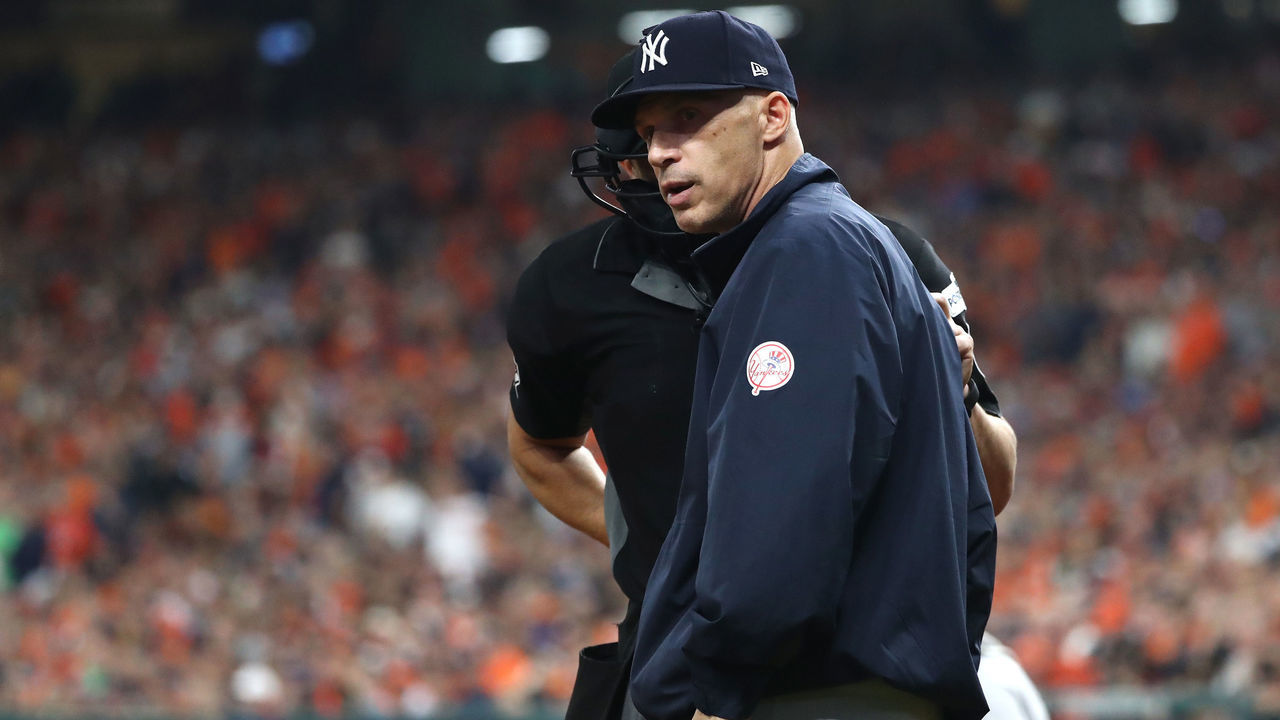 HOUSTON, TX - OCTOBER 20: Manager Joe Girardi #28 of the New York Yankees talks with umpire Jim Reynolds #77 after a pitch during the second inning in Game Six of the American League Championship Series at Minute Maid Park on October 20, 2017 in Houston, Texas.