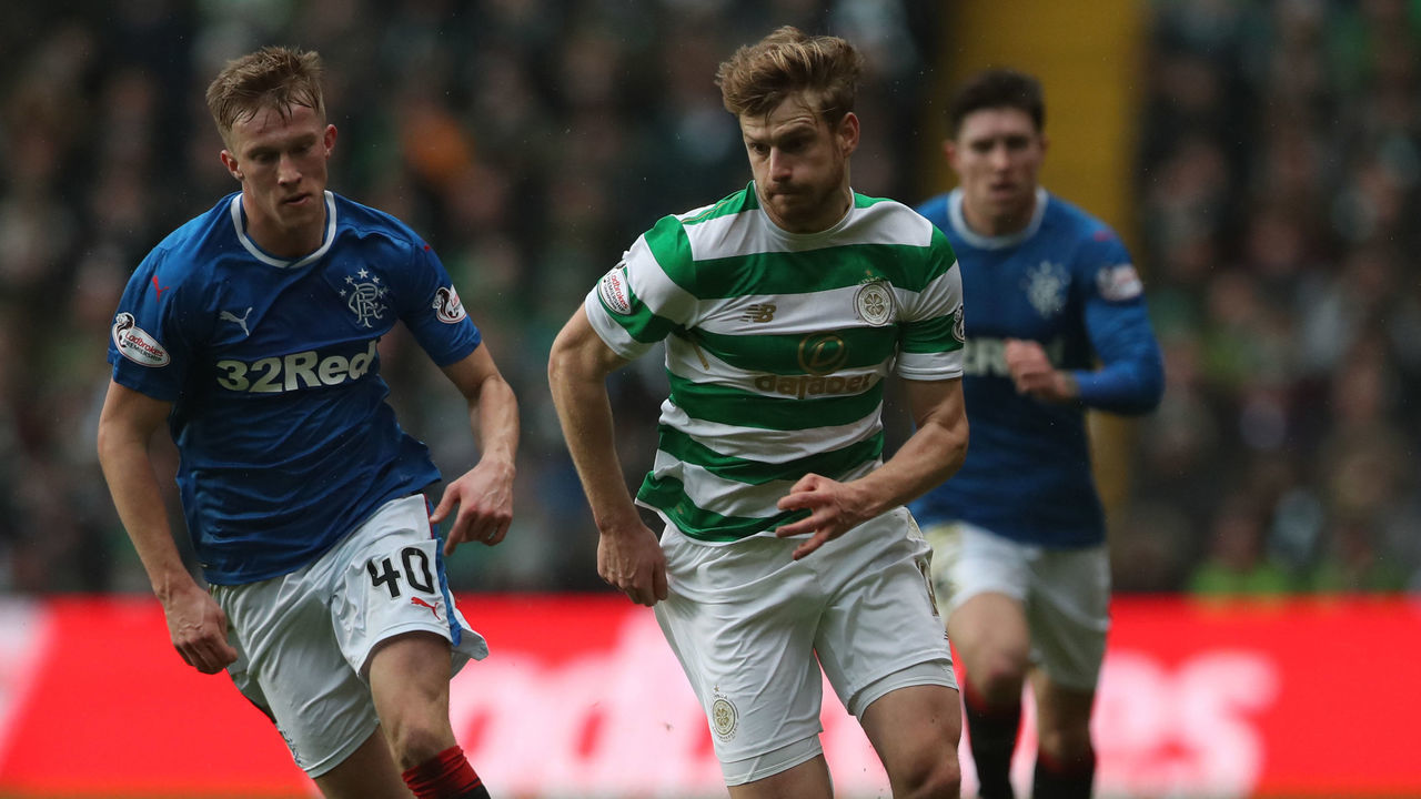 GLASGOW, SCOTLAND - DECEMBER 30: Ross McCrorie of Rangers vies with Stuart Armstrong of Celtic during the Scottish Premier League match between Celtic and Ranger at Celtic Park on December 30, 2017 in Glasgow, Scotland.