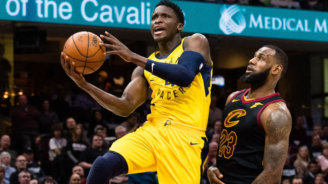 CLEVELAND, OH - APRIL 18: Victor Oladipo #4 of the Indiana Pacers shoots over LeBron James #23 of the Cleveland Cavaliers during the second half of Game 2 of the first round of the Eastern Conference playoffs at Quicken Loans Arena on April 18, 2018 in Cleveland, Ohio. The Cavaliers defeated the Pacers 100-97.