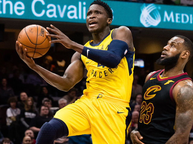 CLEVELAND, OH - APRIL 18: Victor Oladipo #4 of the Indiana Pacers shoots over LeBron James #23 of the Cleveland Cavaliers during the second half of Game 2 of the first round of the Eastern Conference playoffs at Quicken Loans Arena on April 18, 2018 in Cleveland, Ohio. The Cavaliers defeated the Pacers 100-97.