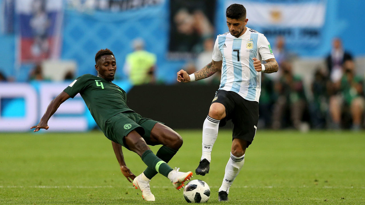 SAINT PETERSBURG, RUSSIA - JUNE 26: Wilfred Ndidi of Nigeria tackles Ever Banega of Argentina during the 2018 FIFA World Cup Russia group D match between Nigeria and Argentina at Saint Petersburg Stadium on June 26, 2018 in Saint Petersburg, Russia.