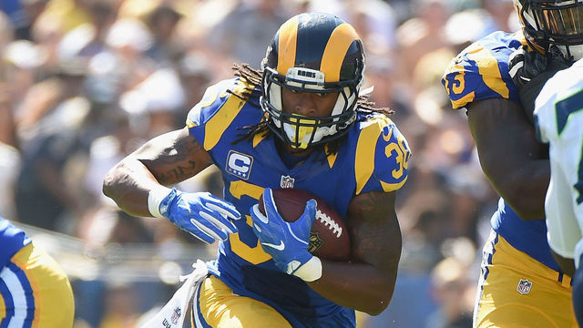 LOS ANGELES, CA - SEPTEMBER 18: Todd Gurley #30 of the Los Angeles Rams cuts throughthe hole during the second quarter of the home opening NFL game against the Seattle Seahawks at Los Angeles Coliseum on September 18, 2016 in Los Angeles, California.