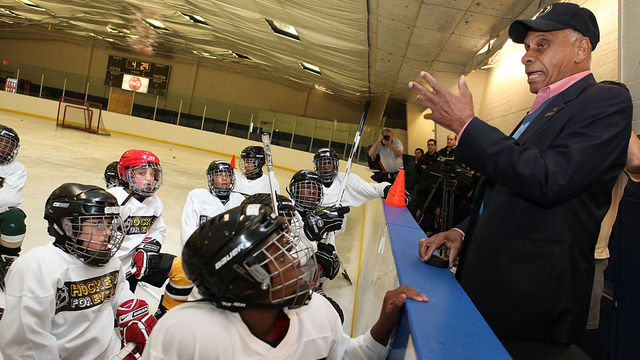 RALEIGH, NC - MAY 15: NHL ambassador Willie O'Ree talks with the Capital City Crew and the Raleigh Youth Hockey Association during a clinic, Hockey is for Everyone, sponsored by the NHL and the Carolina Hurricanes at the Cary Ice House on May 15, 2010 in Raleigh, North Carolina.