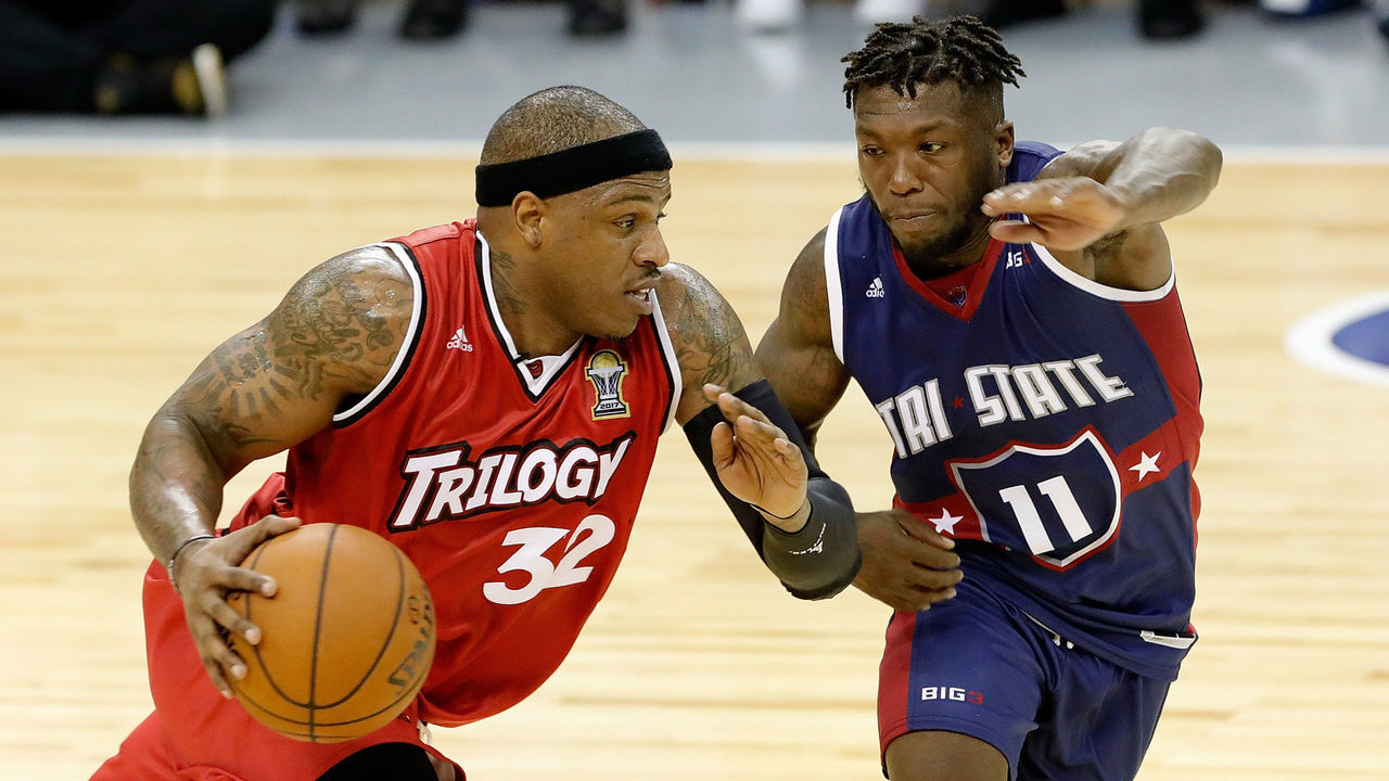 HOUSTON, TX - JUNE 22: Rashad McCants #32 of Trilogy drives against Nate Robinson #11 of Tri State during week one of the BIG3 three on three basketball league at Toyota Center on June 22, 2018 in Houston, Texas.