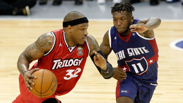 HOUSTON, TX - JUNE 22: Rashad McCants #32 of Trilogy drives against Nate Robinson #11 of Tri State during week one of the BIG3 three on three basketball league at Toyota Center on June 22, 2018 in Houston, Texas.