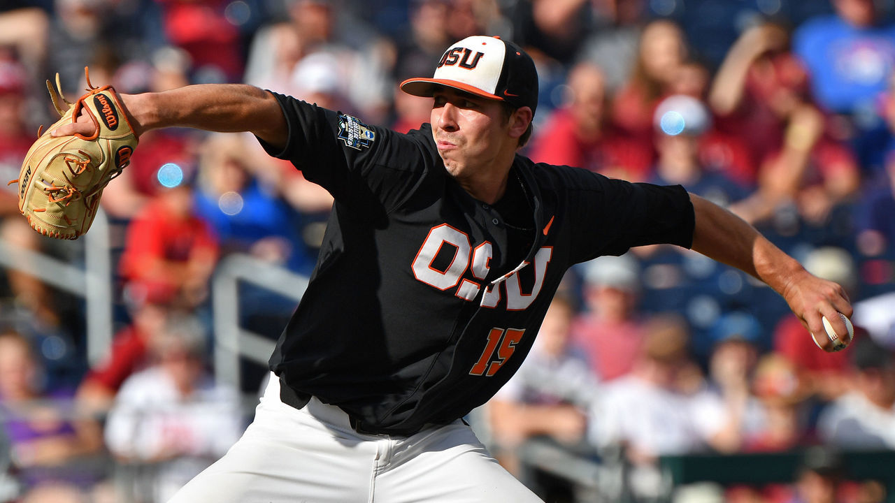 Omaha, NE - JUNE 26: Pitcher Luke Heimlich #15 of the Oregon State Beavers delivers a pitch in the first inning during game one of the College World Series Championship Series against the Arkansas Razorbacks on June 26, 2018 at TD Ameritrade Park in Omaha, Nebraska.