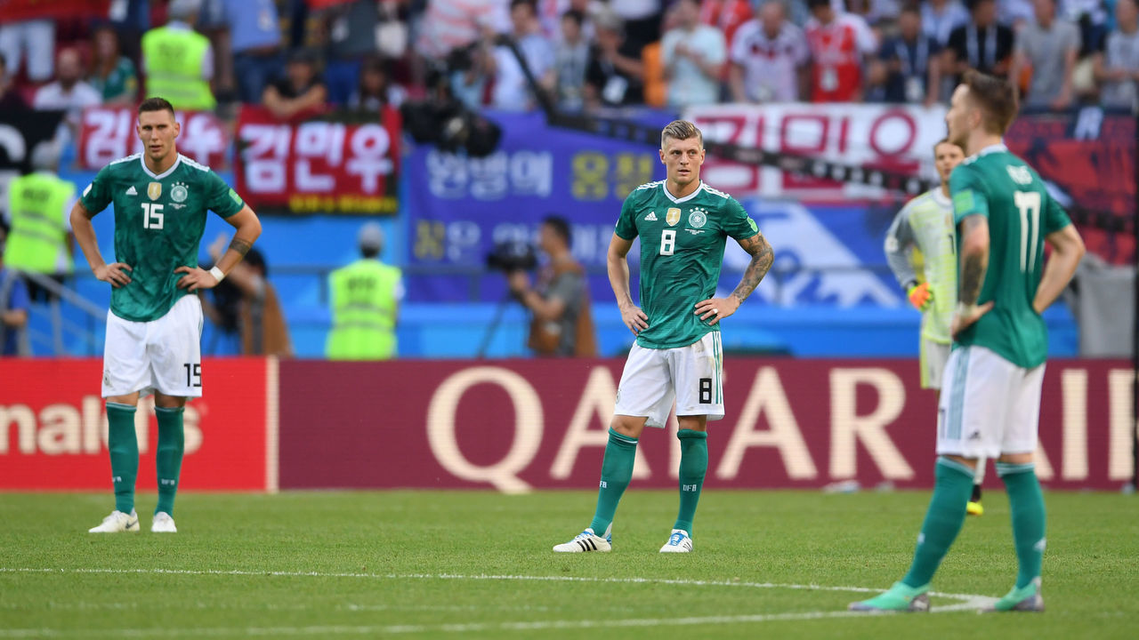 KAZAN, RUSSIA - JUNE 27: Niklas Suele, Toni Kroos, Manuel Neuer and Marco Reus of Germany looks dejected following his sides defeat in the 2018 FIFA World Cup Russia group F match between Korea Republic and Germany at Kazan Arena on June 27, 2018 in Kazan, Russia.