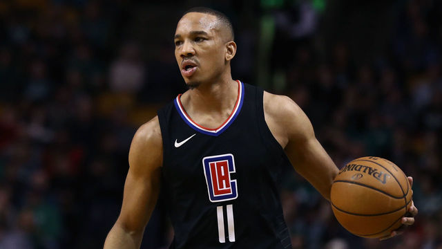 BOSTON, MA - FEBRUARY 14: Avery Bradley #11 of the LA Clippers brings the ball up court during the first quarter of the game against the Boston Celtics at TD Garden on February 14, 2018 in Boston, Massachusetts.
