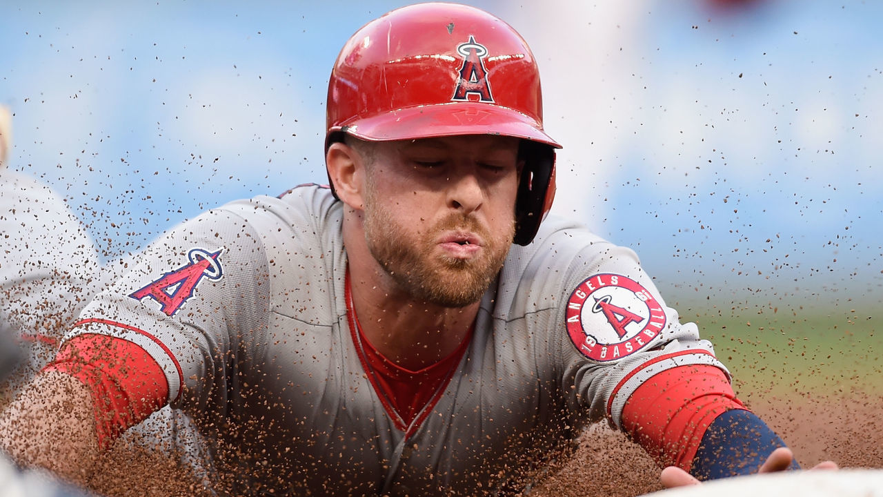 MINNEAPOLIS, MN - JUNE 08: Zack Cozart #7 of the Los Angeles Angels of Anaheim slides safely into third base during the second inning of the game on June 8, 2018 at Target Field in Minneapolis, Minnesota.