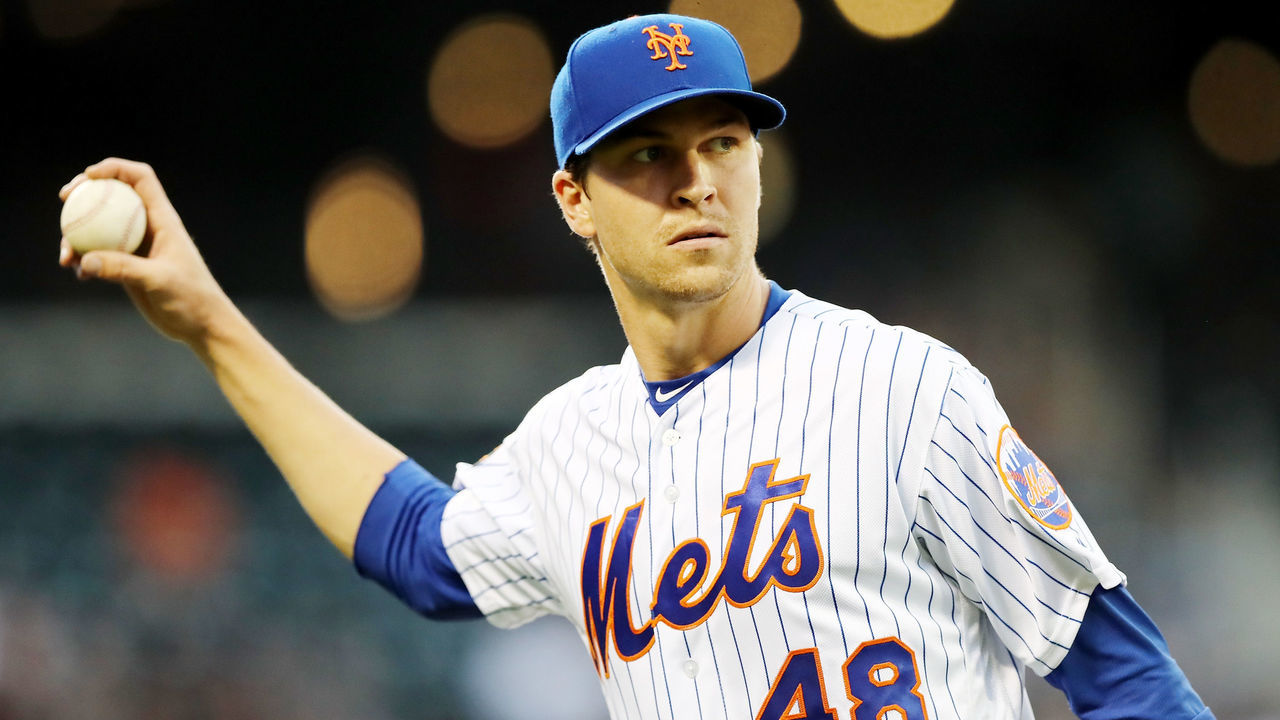 NEW YORK, NY - MAY 02: Jacob deGrom #48 of the New York Mets walks back to the dugout after he made the out at first to end the second inning against the Atlanta Braves on May 2, 2018 at Citi Field in the Flushing neighborhood of the Queens borough of New York City.