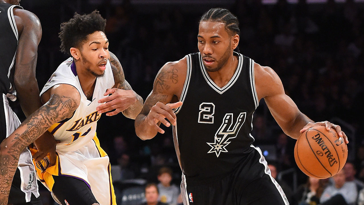 LOS ANGELES, CA - FEBRUARY 26: Kawhi Leonard #2 of the San Antonio Spurs drives to the basket as he gets past Brandon Ingram #14 of the Los Angeles Lakers in the second half of the game at Staples Center on February 26, 2017 in Los Angeles, California. Spurs won 119-98.