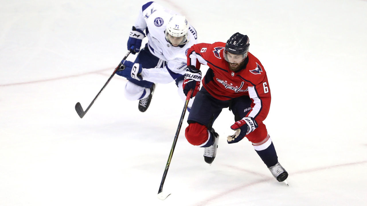 WASHINGTON, DC - MAY 15: Michal Kempny #6 of the Washington Capitals skates for the puck against Anthony Cirelli #71 of the Tampa Bay Lightning during the third period in Game Three of the Eastern Conference Finals during the 2018 NHL Stanley Cup Playoffs at Capital One Arena on May 15, 2018 in Washington, DC.