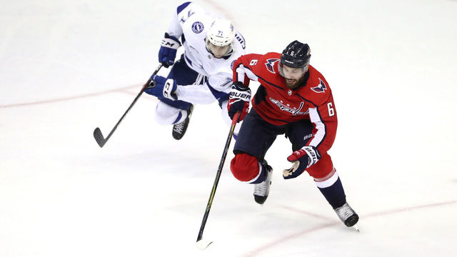 WASHINGTON, DC - MAY 15: Michal Kempny #6 of the Washington Capitals skates for the puck against Anthony Cirelli #71 of the Tampa Bay Lightning during the third period in Game Three of the Eastern Conference Finals during the 2018 NHL Stanley Cup Playoffs at Capital One Arena on May 15, 2018 in Washington, DC.