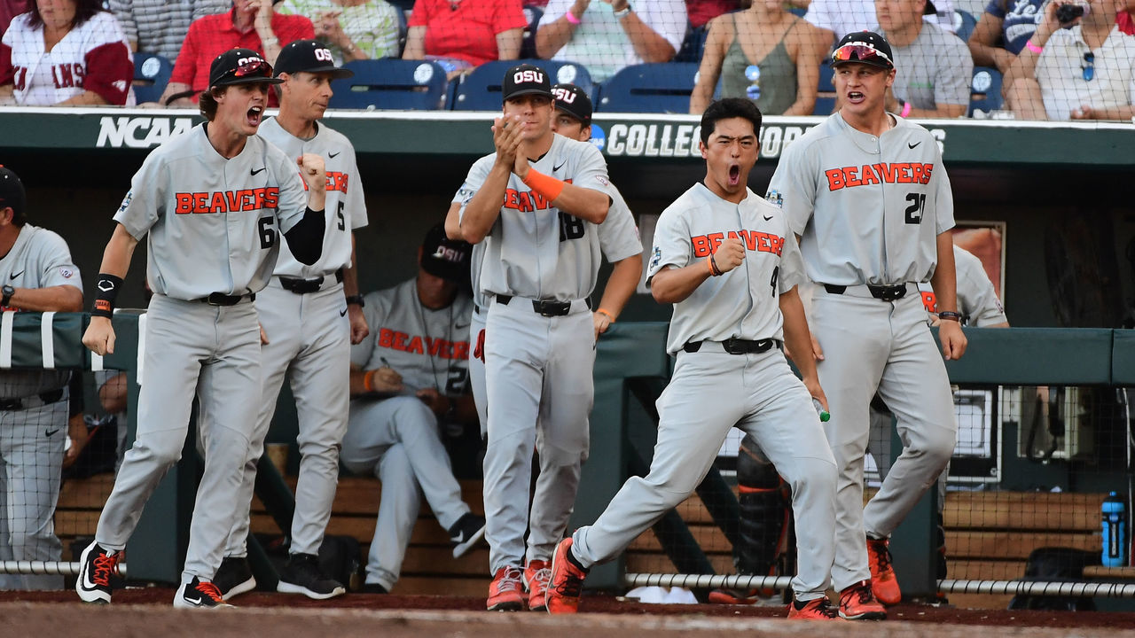 OMAHA, NE - JUNE 27: Oregon State players react after Zak Taylor #16 of Oregon State scores against Arkansas during the Division I Men's Baseball Championship held at TD Ameritrade Park on June 27, 2018 in Omaha, Nebraska.