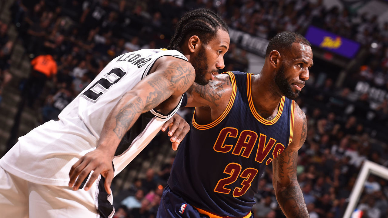SAN ANTONIO, TX - MARCH 27: LeBron James #23 of the Cleveland Cavaliers and Kawhi Leonard #2 of the San Antonio Spurs fight for position during a game on March 27, 2017 at the AT&T Center in San Antonio, Texas. Mandatory Copyright Notice: Copyright 2017 NBAE (Photos by Noah Graham/NBAE via Getty Images)