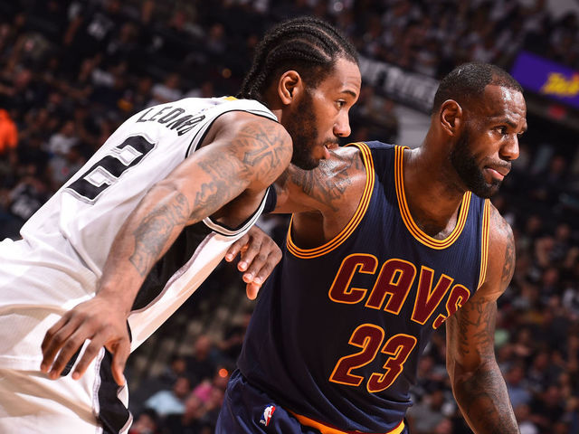 SAN ANTONIO, TX - MARCH 27: LeBron James #23 of the Cleveland Cavaliers and Kawhi Leonard #2 of the San Antonio Spurs fight for position during a game on March 27, 2017 at the AT&T Center in San Antonio, Texas. Mandatory Copyright Notice: Copyright 2017 NBAE (Photos by Noah Graham/NBAE via Getty Images)