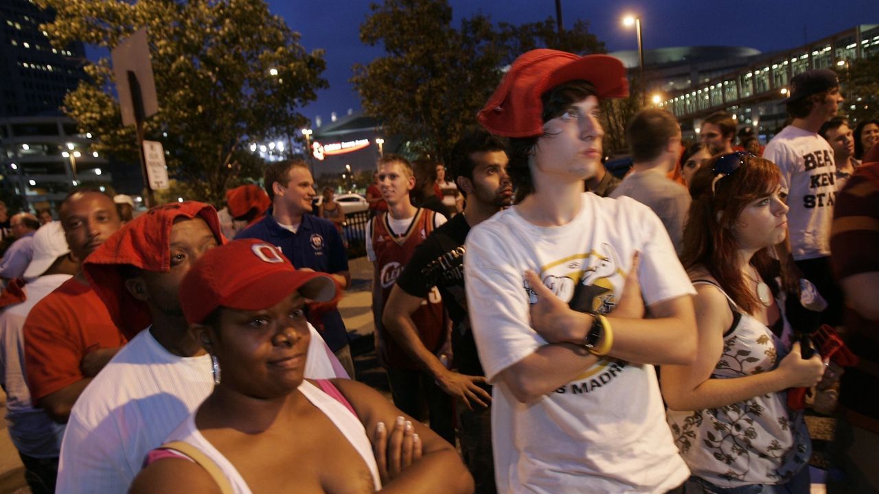 CLEVELAND - JULY 8: Fans react after listening to LeBron James announce he will play next season for the Miami Heat July 8, 2010 in Cleveland, Ohio. The two-time Most Valuable Player made the choice to play for Miami next season.