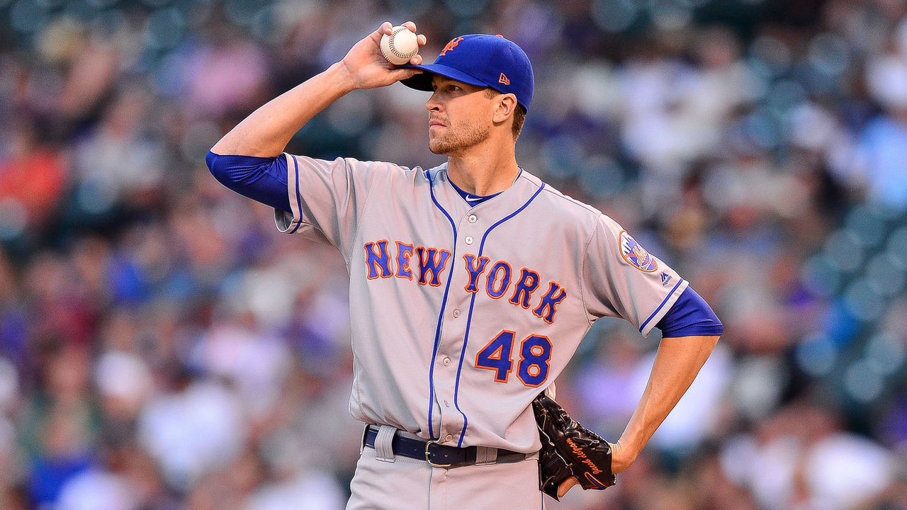 DENVER, CO - JUNE 18: Jacob deGrom #48 of the New York Mets reacts after allowing consecutive doubles in the second inning of a game at Coors Field on June 18, 2018 in Denver, Colorado.