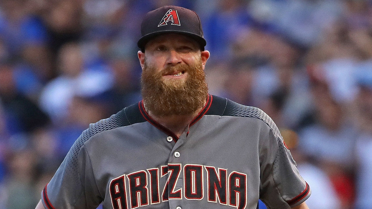 CHICAGO, IL - AUGUST 03: Archie Bradley #25 of the Arizona Diamondbacks reacts after giving up a two run single in the 7th inning to Willson Contreras of the Chicago Cubs at Wrigley Field on August 3, 2017 in Chicago, Illinois.