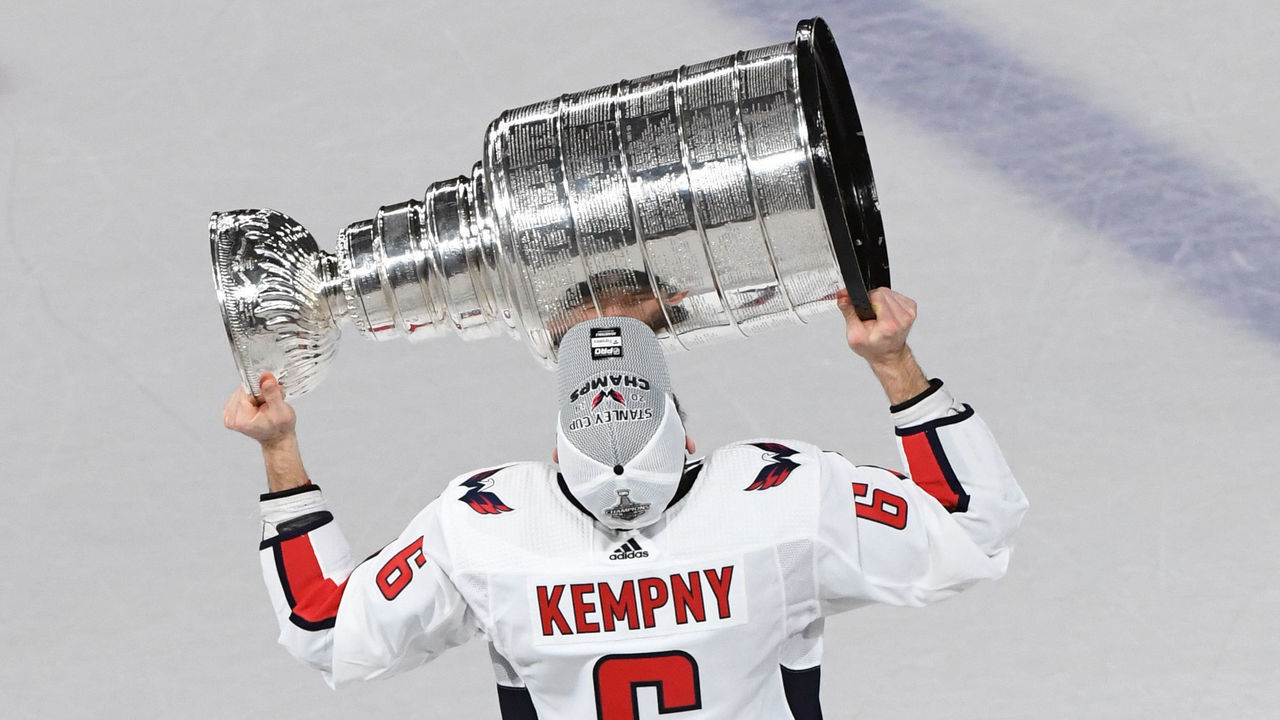 LAS VEGAS, NV - JUNE 07: Michal Kempny #6 of the Washington Capitals hoists the Stanley Cup after his team defeated the Vegas Golden Knights 4-3 in Game Five of the 2018 NHL Stanley Cup Final at T-Mobile Arena on June 7, 2018 in Las Vegas, Nevada.
