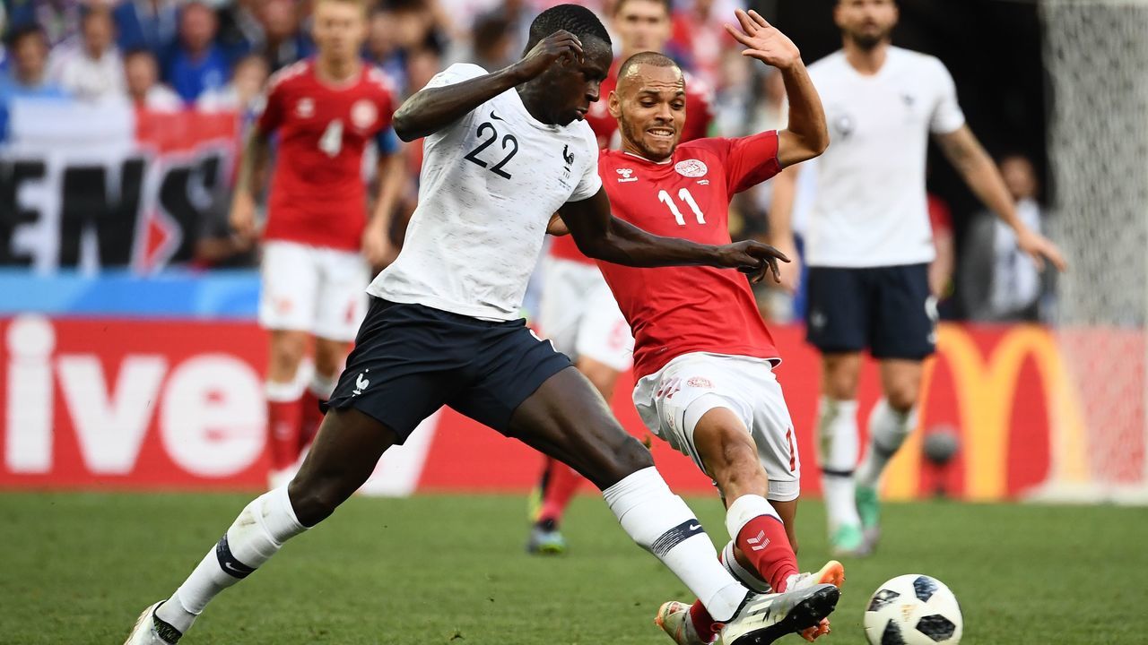 France's defender Benjamin Mendy (L) vies with Denmark's forward Martin Braithwaite during the Russia 2018 World Cup Group C football match between Denmark and France at the Luzhniki Stadium in Moscow on June 26, 2018.