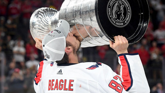 LAS VEGAS, NV - JUNE 07: Jay Beagle #83 of the Washington Capitals hoists the Stanley Cup after his team defeated the Vegas Golden Knights 4-3 in Game Five of the 2018 NHL Stanley Cup Final at T-Mobile Arena on June 7, 2018 in Las Vegas, Nevada.