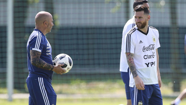 BRONNITSY, RUSSIA - JUNE 29: Lionel Messi of Argentina and Jorge Sampaoli coach of Argentina talk during a training session at Stadium of Syroyezhkin sports school on June 28, 2018 in Bronnitsy, Russia.