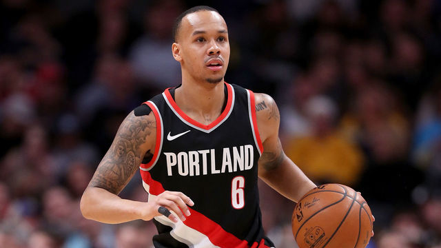 DENVER, CO - JANUARY 22: Shabazz Napier #6 of the Portland Trail Blazers brings the ball down the court against the Denver Nuggets at the Pepsi Center on January 22, 2018 in Denver, Colorado.