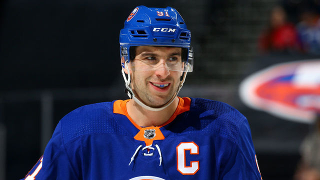 NEW YORK, NY - MARCH 18: John Tavares #91 of the New York Islanders skates against the Carolina Hurricanesat Barclays Center on March 18, 2018 in New York City. Carolina Hurricanes defeated the New York Islanders 4-3