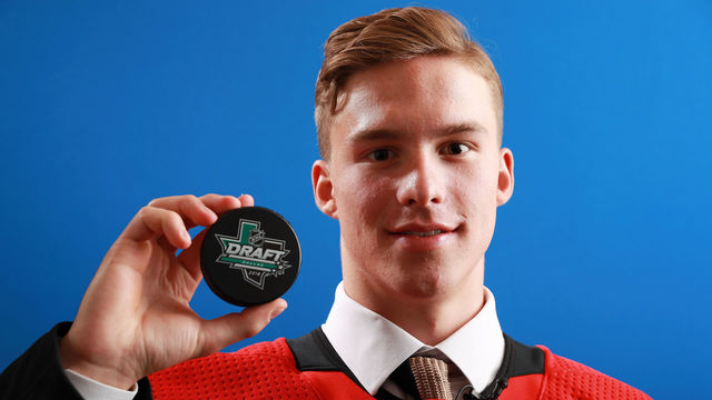 DALLAS, TX - JUNE 22: Andrei Svechnikov poses after being selected second overall by the Carolina Hurricanes during the first round of the 2018 NHL Draft at American Airlines Center on June 22, 2018 in Dallas, Texas.