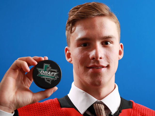 DALLAS, TX - JUNE 22: Andrei Svechnikov poses after being selected second overall by the Carolina Hurricanes during the first round of the 2018 NHL Draft at American Airlines Center on June 22, 2018 in Dallas, Texas.