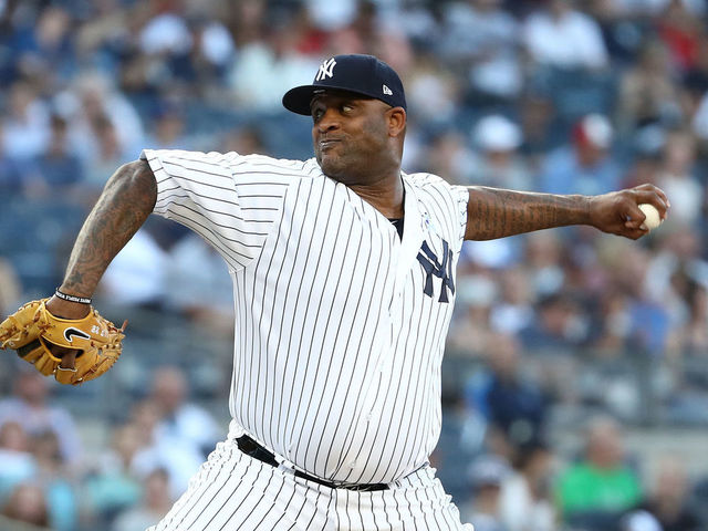 NEW YORK, NY - JUNE 29: CC Sabathia #52 of the New York Yankees pitches against the Boston Red Sox during their game at Yankee Stadium on June 29, 2018 in New York City.