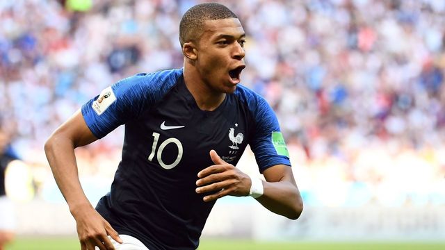 France's forward Kylian Mbappe celebrates after scoring their third goal during the Russia 2018 World Cup round of 16 football match between France and Argentina at the Kazan Arena in Kazan on June 30, 2018.