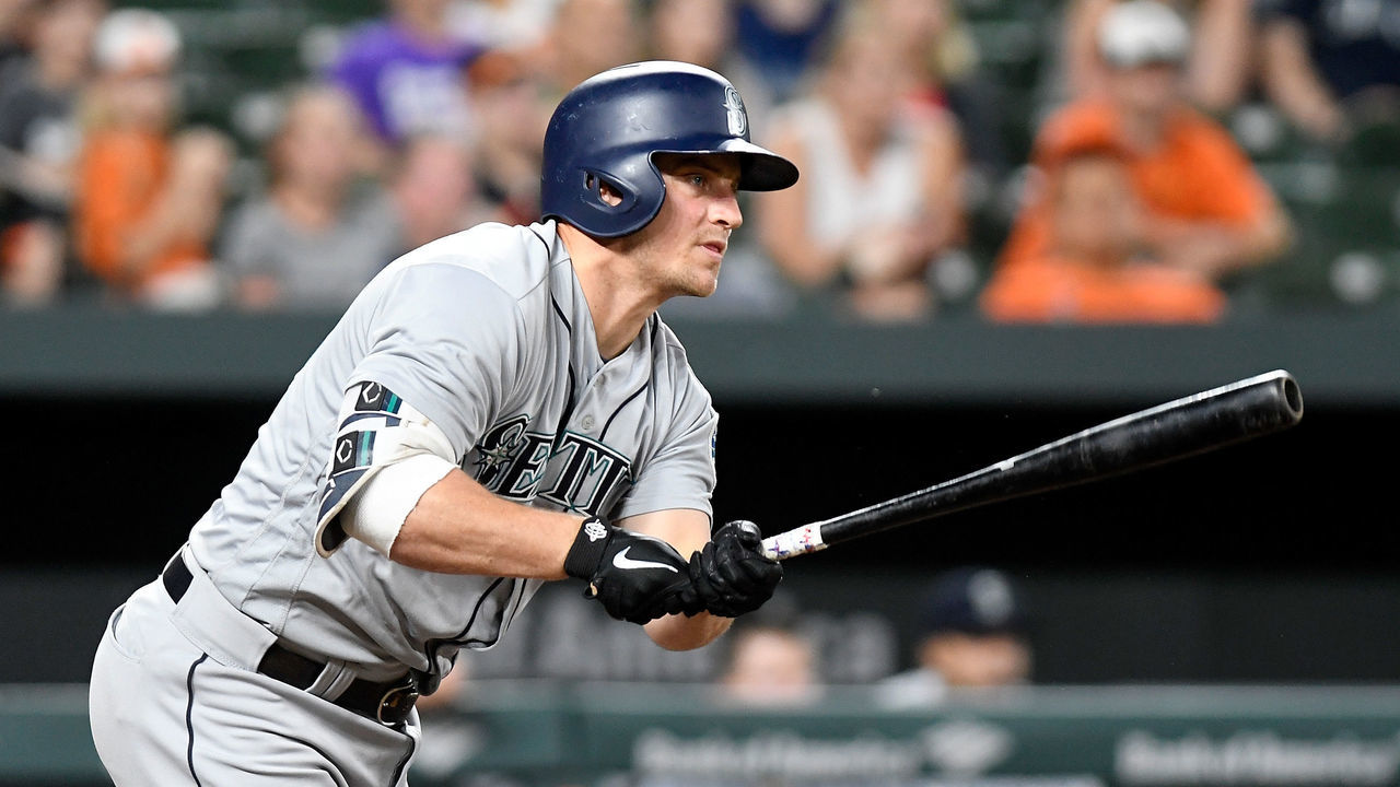 BALTIMORE, MD - JUNE 27: Kyle Seager #15 of the Seattle Mariners hits a single in the eleventh inning against the Baltimore Orioles at Oriole Park at Camden Yards on June 27, 2018 in Baltimore, Maryland.