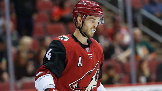 GLENDALE, AZ - MARCH 19: Arizona Coyotes defenseman Niklas Hjalmarsson (4) looks on during the NHL hockey game between the Calgary Flames and the Arizona Coyotes on March 19, 2018 at Gila River Arena in Glendale, Arizona.