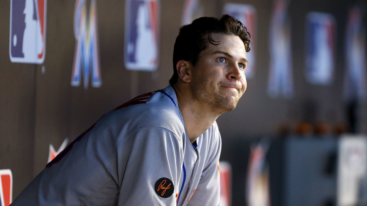 MIAMI, FL - JUNE 30: Jacob deGrom #48 of the New York Mets reacts in the dugout against the Miami Marlins at Marlins Park on June 30, 2018 in Miami, Florida.