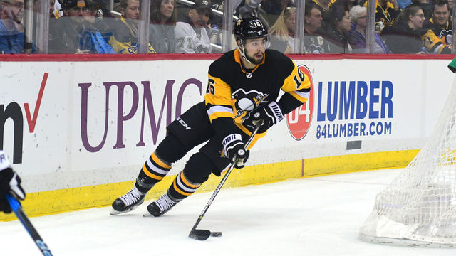 PITTSBURGH, PA - APRIL 06: Josh Jooris #16 of the Pittsburgh Penguins skates with the puck against the Ottawa Senators at PPG PAINTS Arena on April 6, 2018 in Pittsburgh, Pennsylvania.
