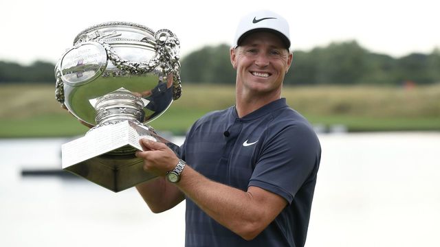 Swedish golfer Alex Noren holds the trophy after winning the HNA Open de France, as part of the European Tour 2018, at the Saint-Quentin-en-Yvelines national golf course in Guyancourt on July 1, 2018.