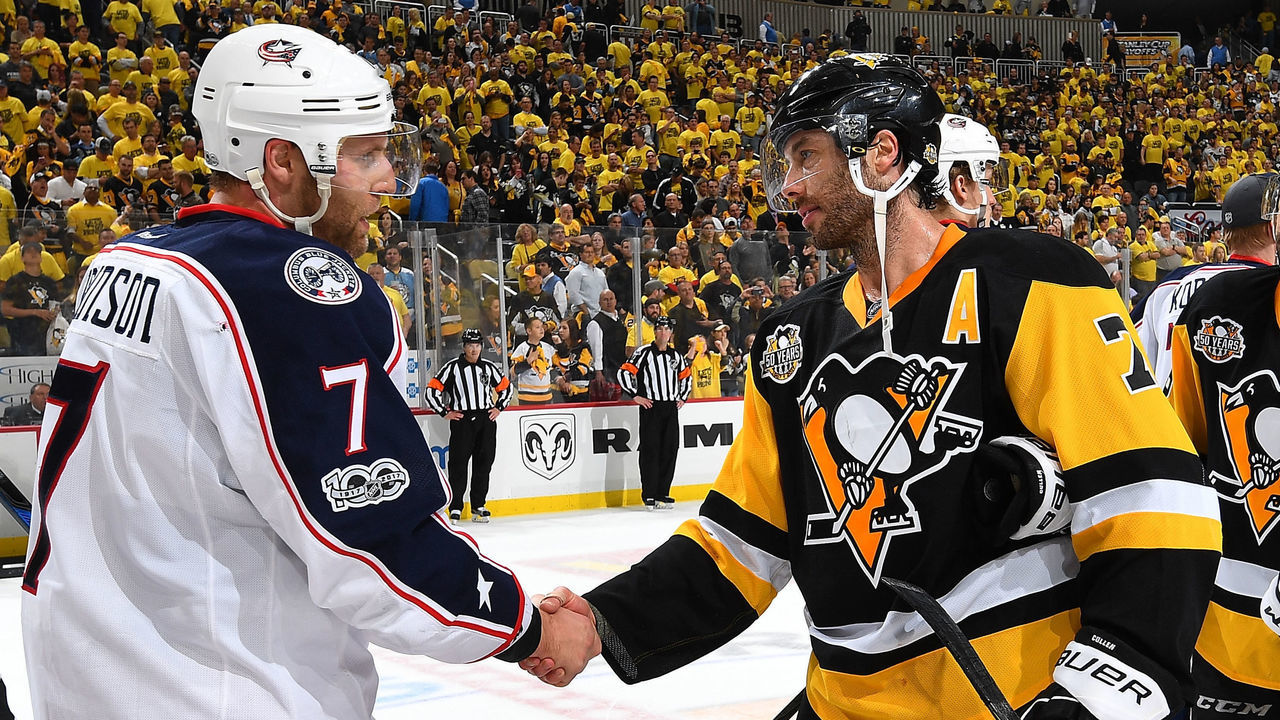 PITTSBURGH, PA - APRIL 20: Matt Cullen #7 of the Pittsburgh Penguins shakes hands with Jack Johnson #7 of the Columbus Blue Jackets after a 5-2 win in Game Five of the Eastern Conference First Round during the 2017 NHL Stanley Cup Playoffs at PPG Paints Arena on April 20, 2017 in Pittsburgh, Pennsylvania.