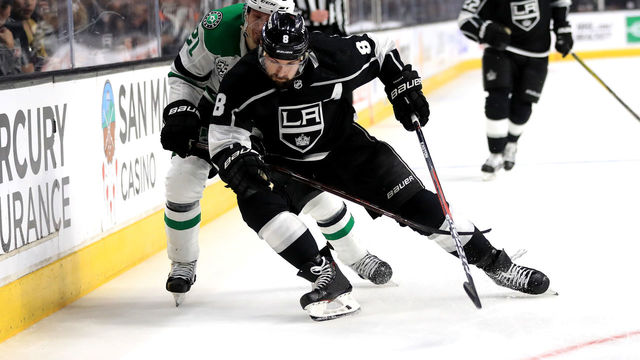 LOS ANGELES, CA - APRIL 07: Drew Doughty #8 of the Los Angeles Kings battles Antoine Roussel #21 of the Dallas Stars for postition during the third period of a game at Staples Center on April 7, 2018 in Los Angeles, California.