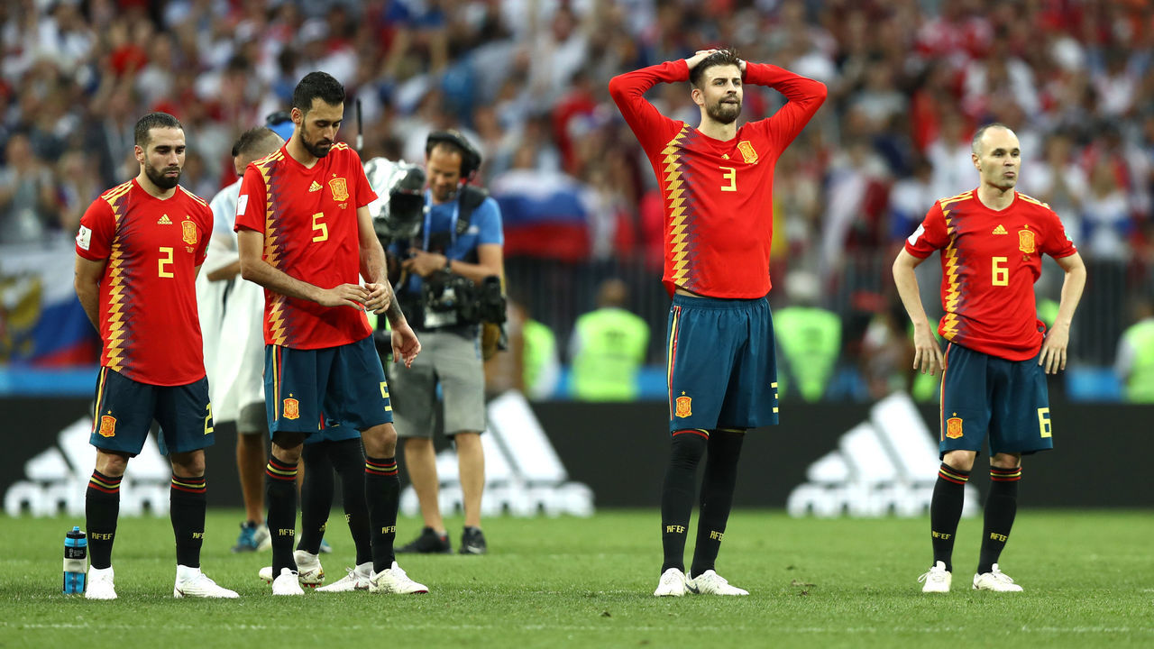 MOSCOW, RUSSIA - JULY 01: Spain players look dejected following team mate Koke (not pictured) missing his team's third penalty during the penalty shoot out during the 2018 FIFA World Cup Russia Round of 16 match between Spain and Russia at Luzhniki Stadium on July 1, 2018 in Moscow, Russia.