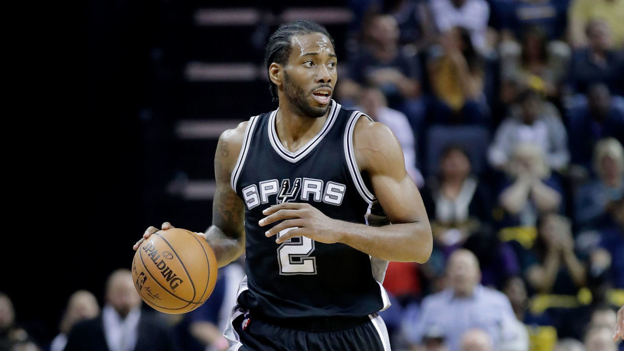 MEMPHIS, TN - APRIL 22: Kawhi Leonard #2 of the San Antonio Spurs dribbles the ball against the Memphis Grizzlies in game four of the Western Conference Quarterfinals during the 2017 NBA Playoffs at FedExForum on April 22, 2017 in Memphis, Tennessee.